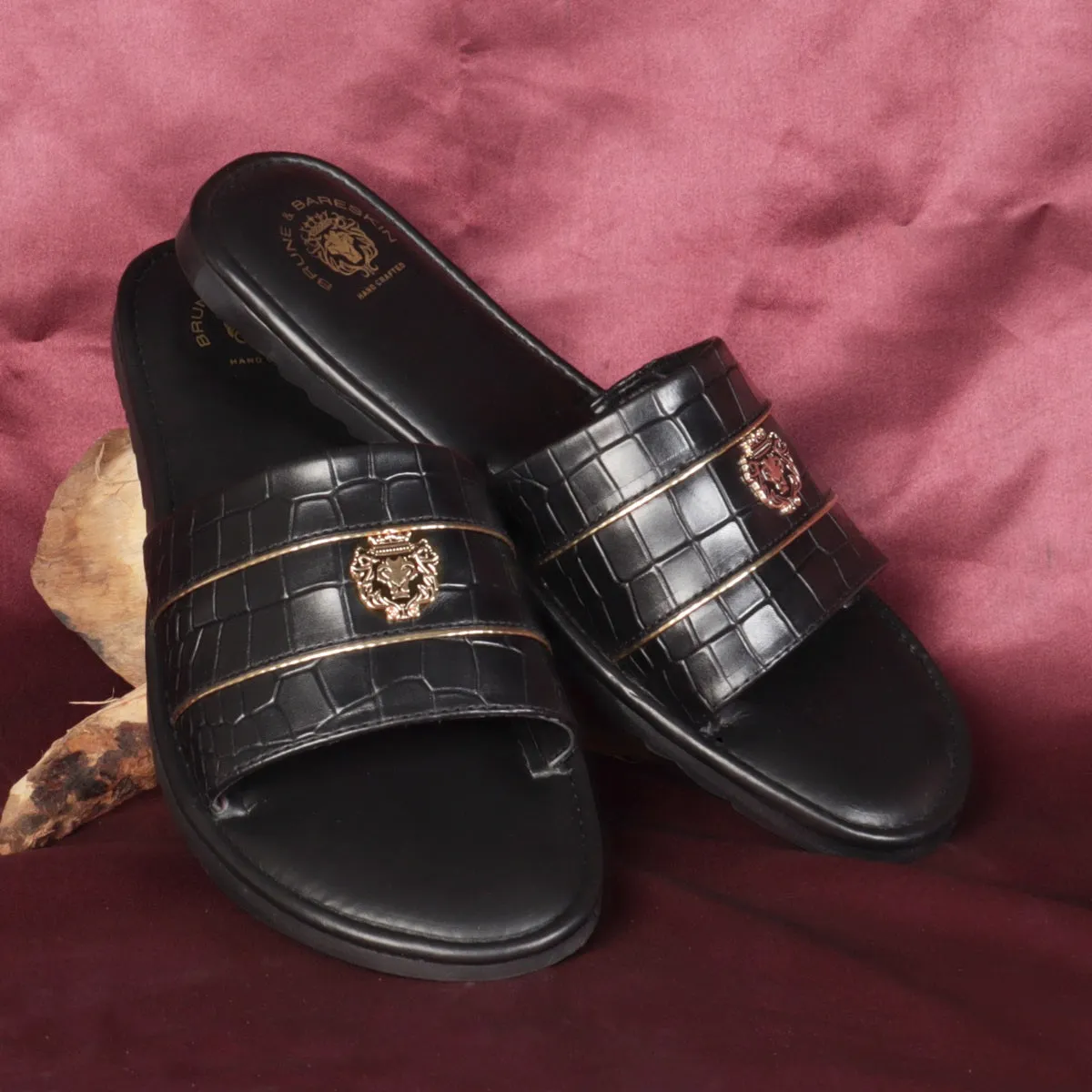 Black Deep Cut Croco Leather With Signature Metal Lion Slide-In-Slippers by BRUNE BY BARESKIN