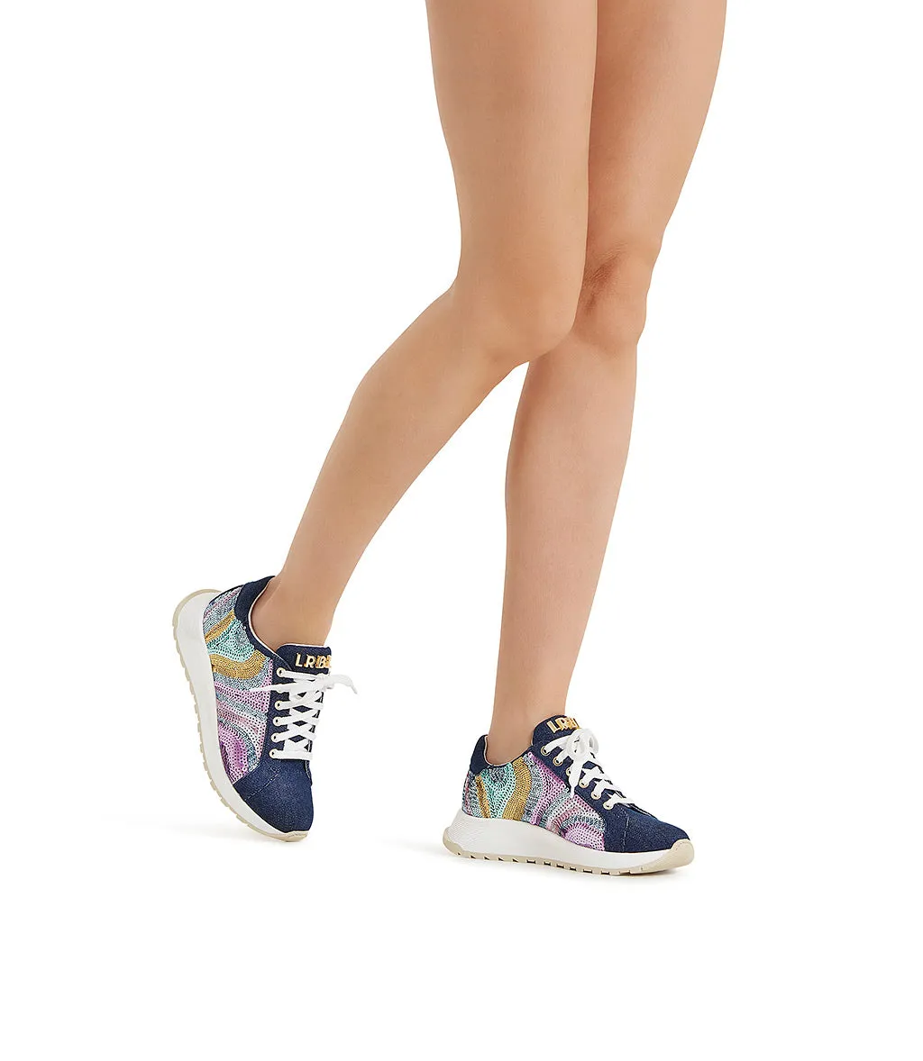 Denim sneakers embellished with colorful sequins.