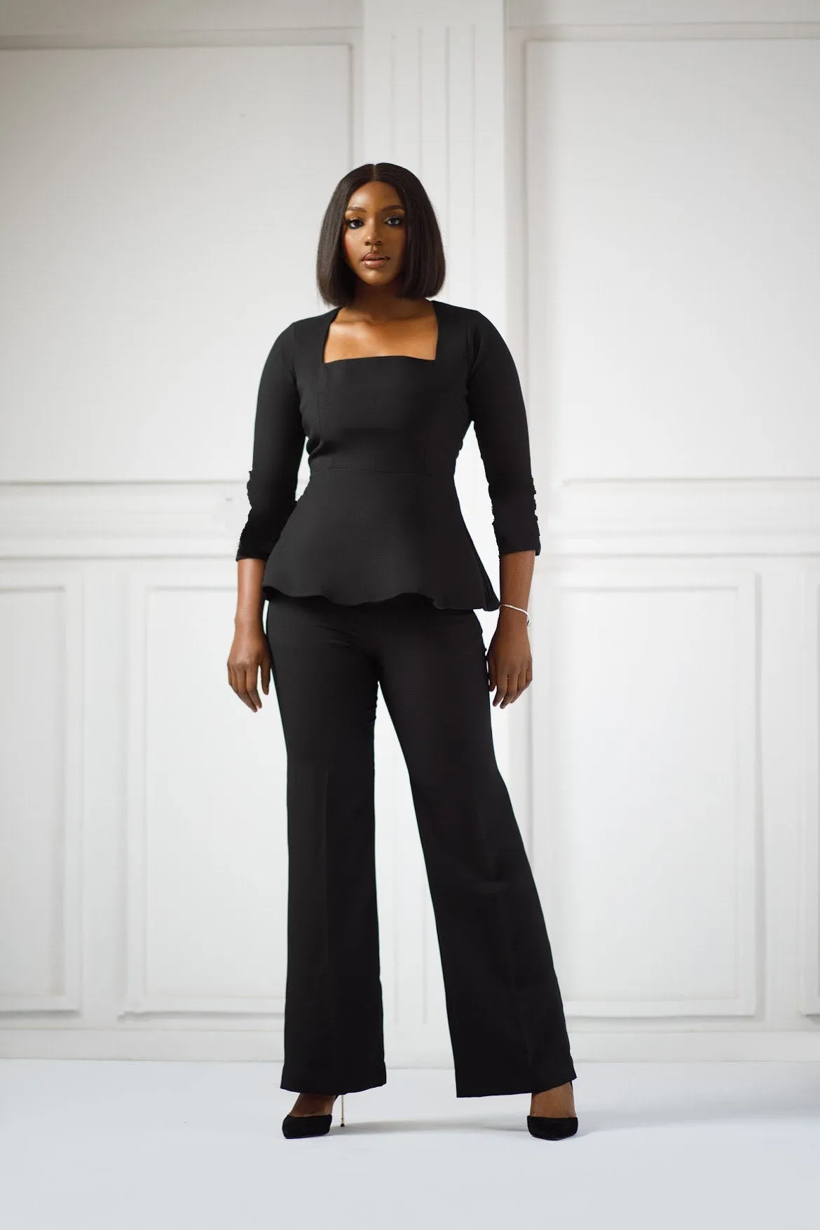 Erilyn Funmilayo set with a peplum top and flared-leg trousers