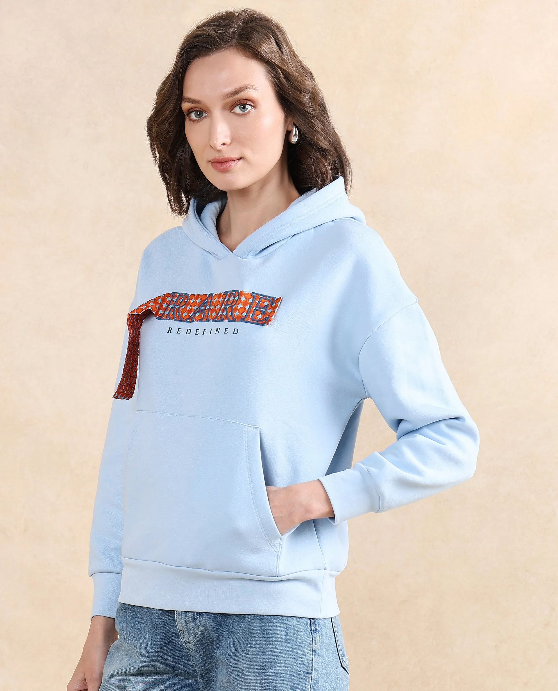 Rareism Women Emtap Light Blue Cotton Blend Fabric Full Sleeve Hooded Relaxed Fit Graphic Print Sweatshirt