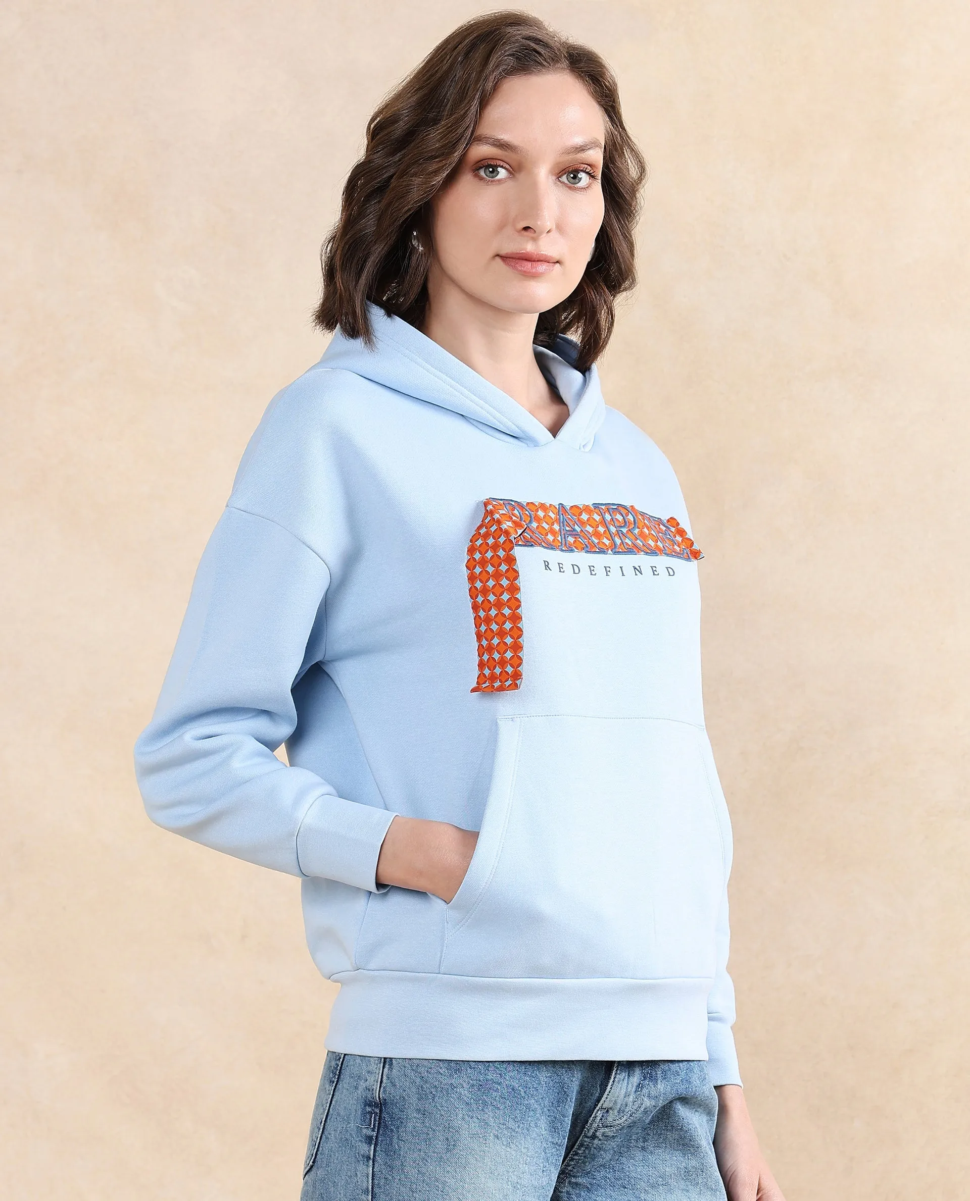 Rareism Women Emtap Light Blue Cotton Blend Fabric Full Sleeve Hooded Relaxed Fit Graphic Print Sweatshirt