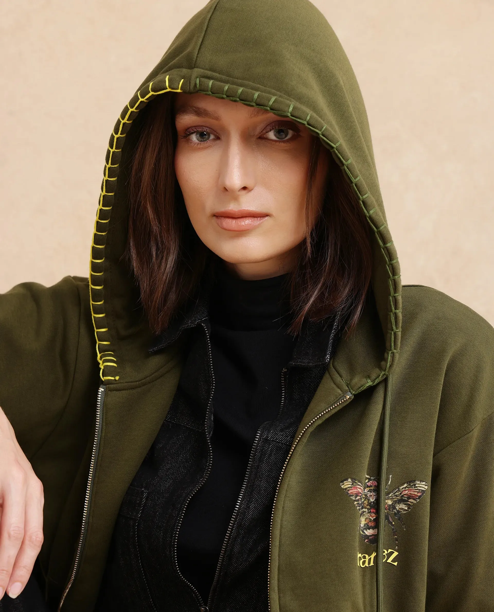 Rareism Women Hemian Olive Cotton Blend Fabric Full Sleeve Hooded Zipper Closure Relaxed Fit Graphic Print Sweatshirt