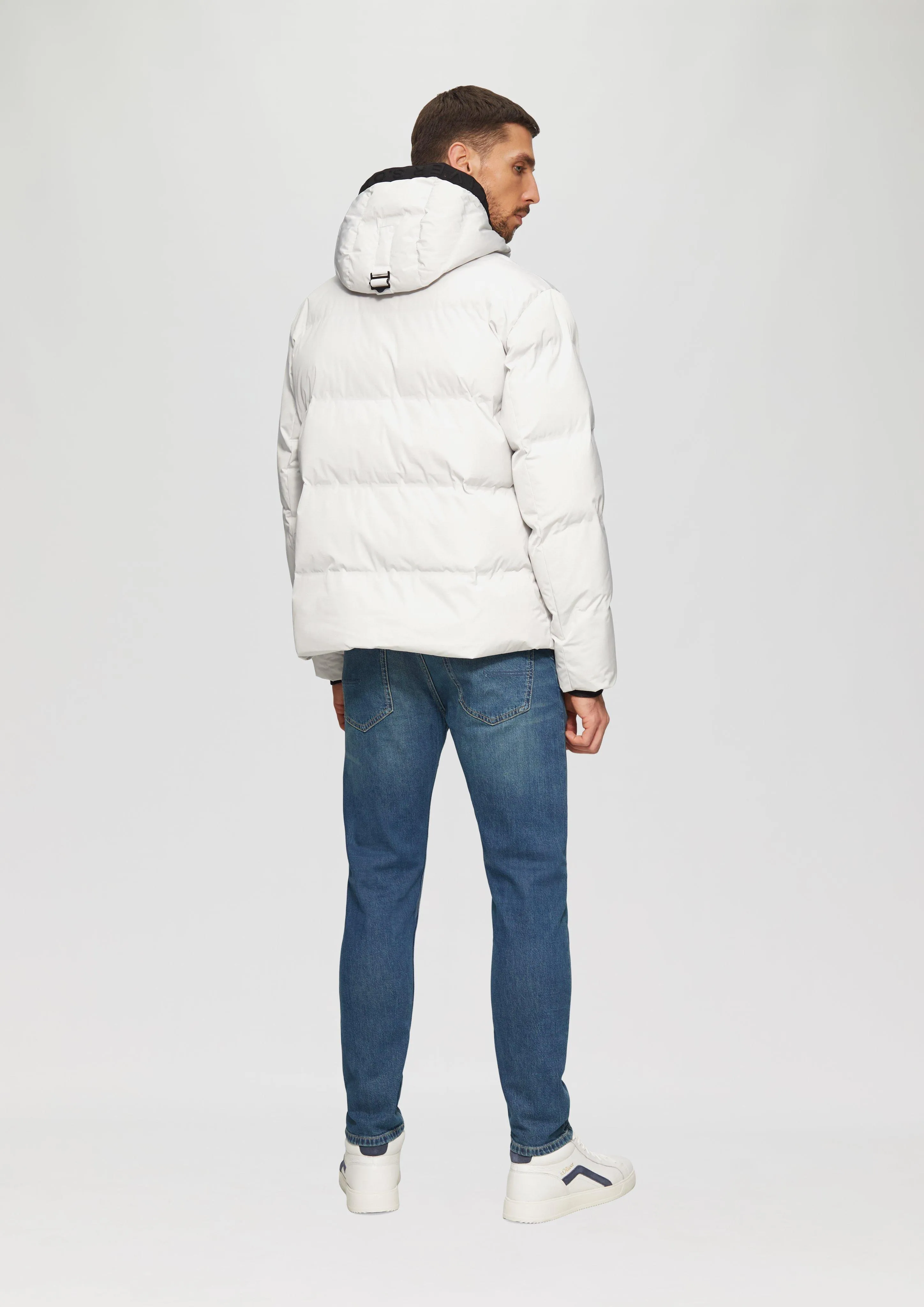 Water-resistant puffer jacket with a hood