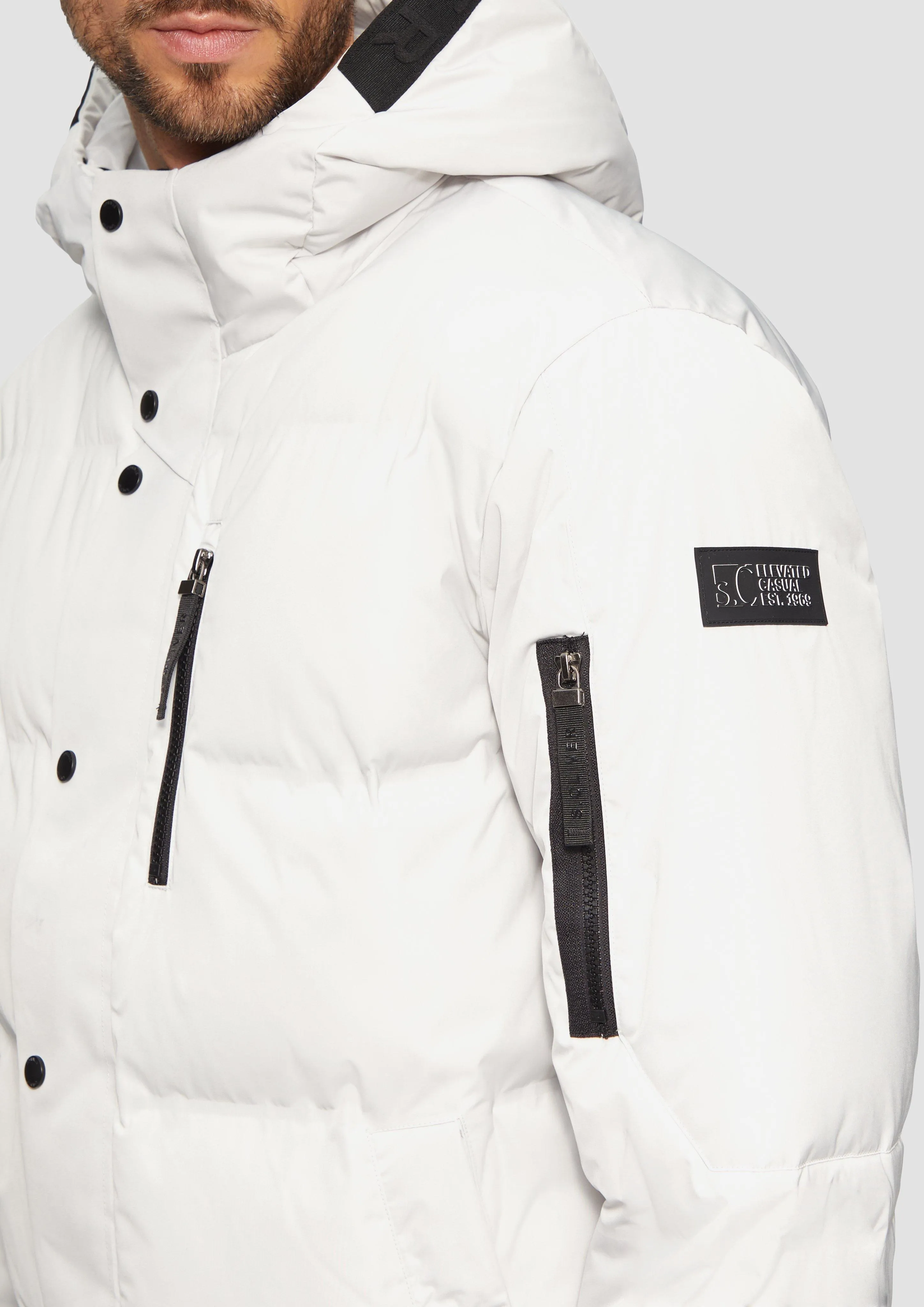 Water-resistant puffer jacket with a hood