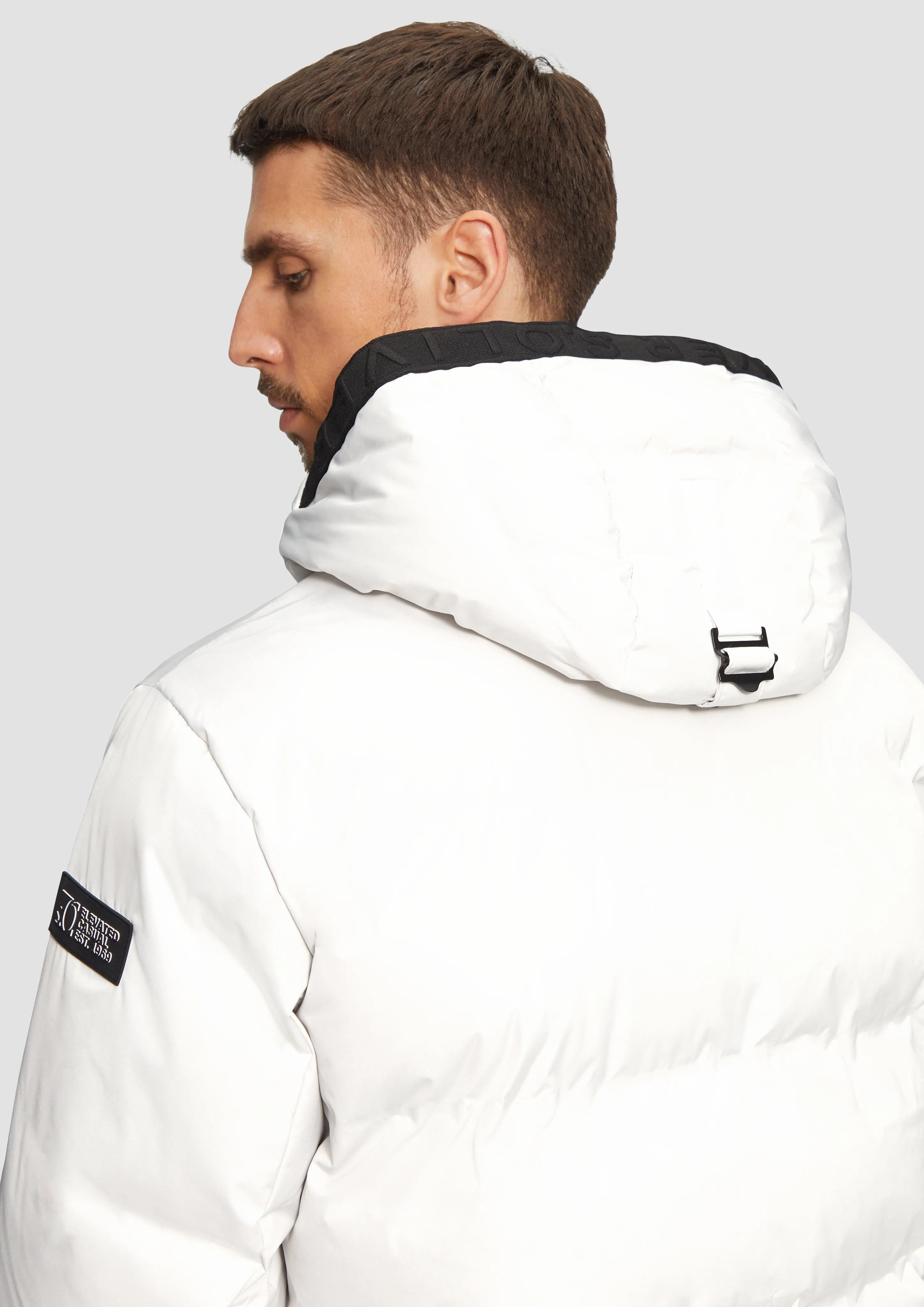 Water-resistant puffer jacket with a hood